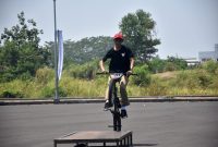 Penampilan Reza menampilkan trik diatas obstckle sukses menjadikannya juara 1 kategori BMX Street